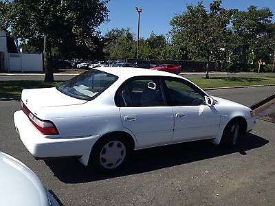 Toyota : Corolla DX Low, low mileage!  Pirelli Tires! ICE COLD AC, GREAT HEAT!