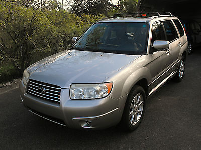 Subaru : Forester Vinyl, with plush seat covers  Mail Delivery Vehicle