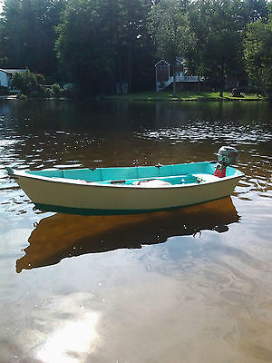 Vintage Restored Wooden Row Boat With Outboard