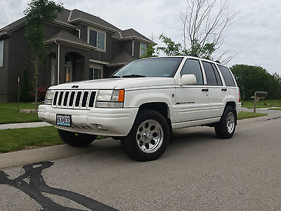 Jeep : Grand Cherokee Limited Sport Utility 4-Door 1998 jeep grand cherokee limited v 8 5.2 l full time 4 x 4 loaded