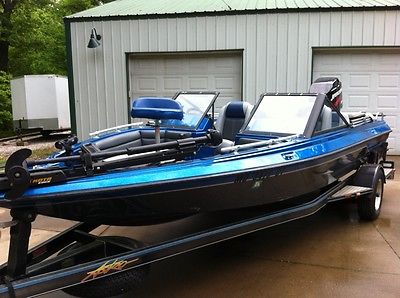 1990 astro fish & ski boat, trailer, 2000 mercury outboard 150 hp.