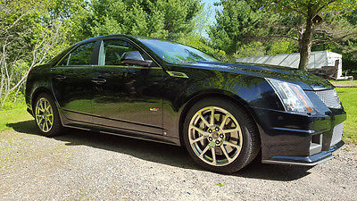 Cadillac : CTS CTS-V 2009 cadillac cts v sedan 4 door 6.2 l black on black recaro seats pano sunroof