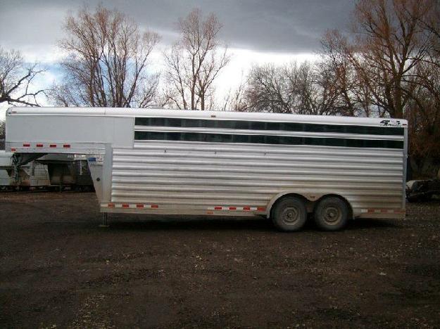 2009 4 Star 3 horse trailer aluminum and has 7000 axles