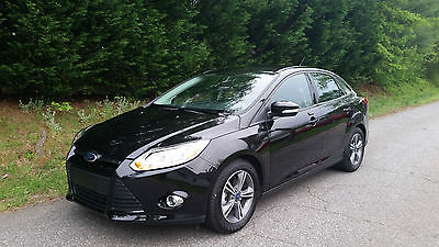 Ford : Focus SE Sedan 4-Door Ford Focus 2014 SE, Black, Great condition. Low milage. Like New.