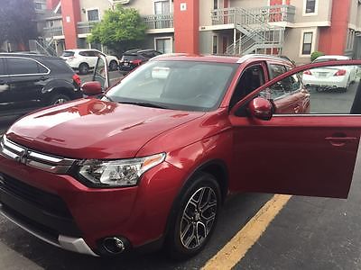 Mitsubishi : Outlander CARFAX is available. Clean title, no accident. Just changed oil.