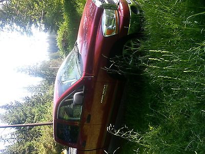 Dodge : Ram 1500 SLT Quad Cab Inferno red, original owner and good condition, 137,000 miles.