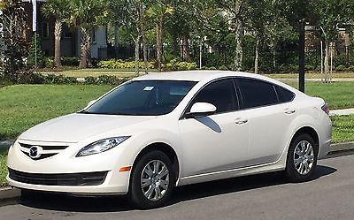 Mazda : Mazda6 I sedan sport Mazda 6 I sport sedan . Pearl white with beige cloth interior . 4 cylinder