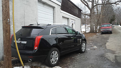 Cadillac : SRX 2011   LUXURY PANO SUNROOF REAR CAM 10K MI 2011 srx only 10 k miles fwd navi pan sunroof needs to be finished
