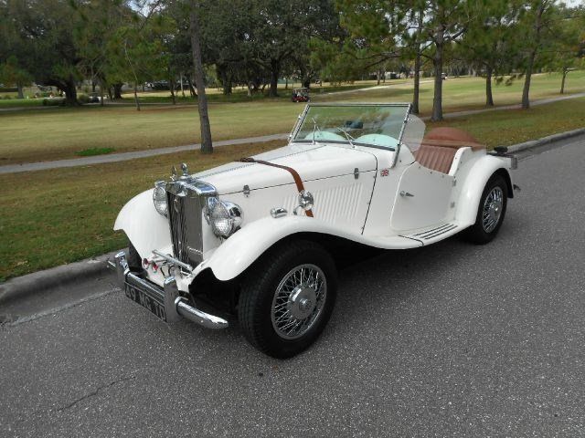 MG : T-Series Replica Cust 1949 mgtd replica 4 cylinder vw 4 speed empi shifter soft top side curtains