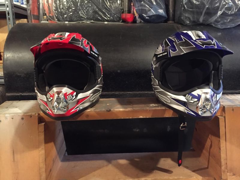 Two Atv Helmets