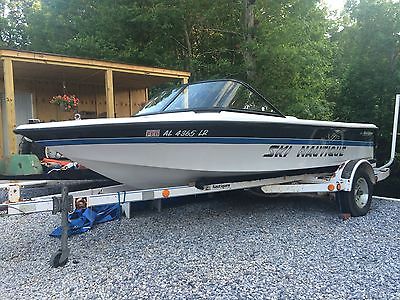 1996 Ski Nautique white hull with blue and black stripes excellant condition