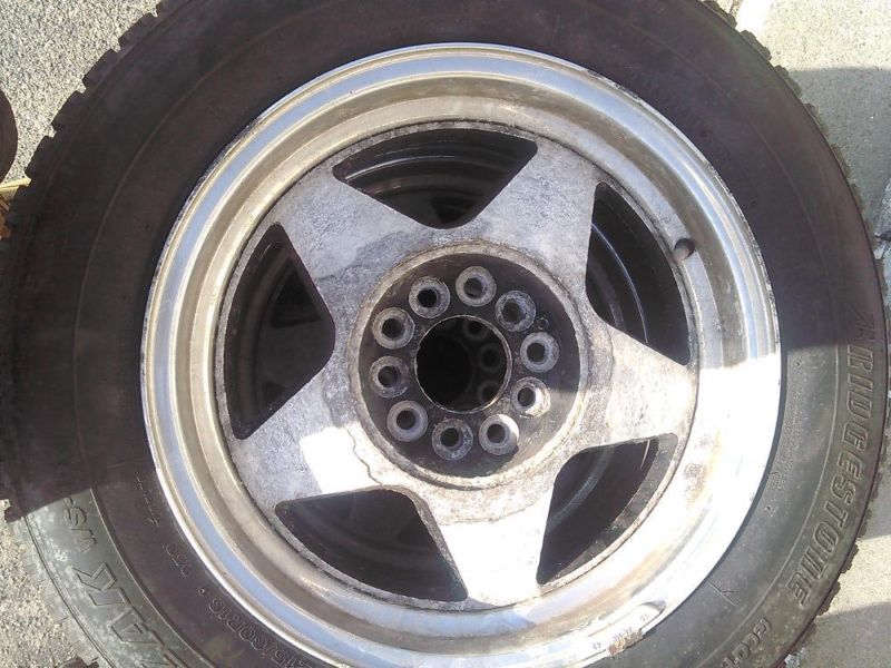 4 96 mustang rims with snow tires