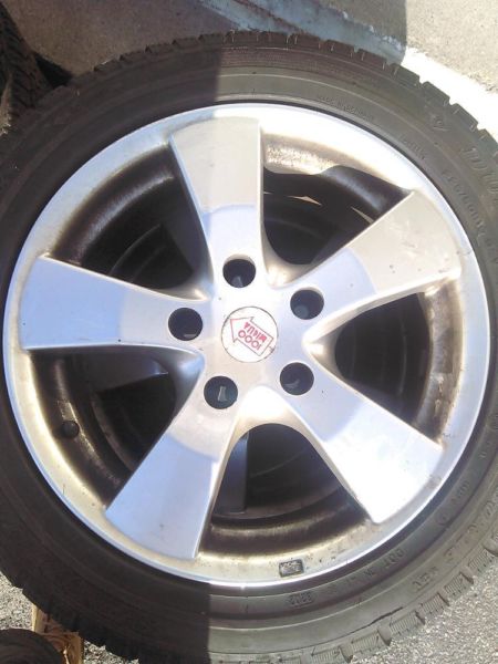4 BMW rims with Dunlop snow tires