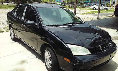 Ford : Focus ZX4  Project car, body damage drives great, automatic transmission, power windows