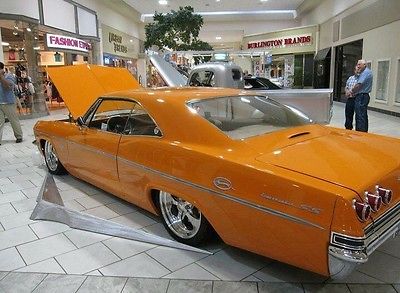 Chevrolet : Impala Impala Custom orange with Air Ride, shaved door handles