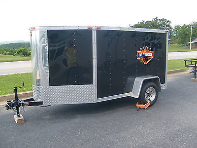 ENCLOSED 5 x 8 HARLEY CARGO TRAILER WITH V-NOSE, TIE DOWNS,LOCKING WHEEL CHOCK