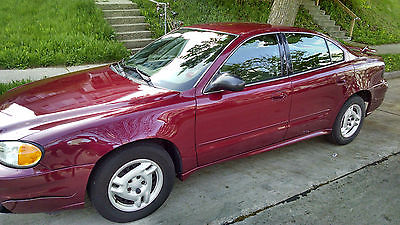 Pontiac : Grand Am 4-door Coupe Red 2005 Pontiac Grand Am. Automatic, AC Heat, Great running condition!