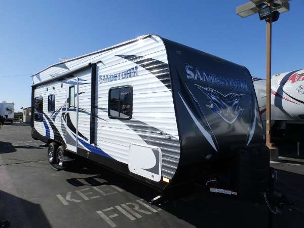 2016  Forest River  SANDSTORM 240 SLC FRONT WALK AROUND QUEEN BED  REAR SINGLE ELECTRIC BED  CAPTAIN CHAIRS 200 WATT SOLAR PANEL  ARCTIC PACKAGE