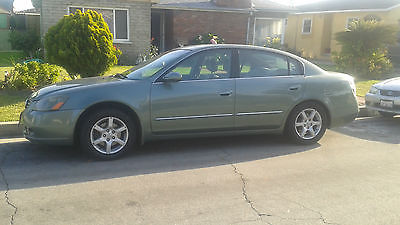 Nissan : Altima 2.5 SL good condition, very clean, run smooth, all leather interior, bosse audio,