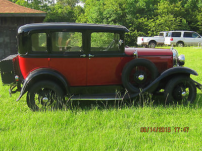 Ford : Model A Black and red,  Exellent condition,  4 Door Sedan, 4 cylinders