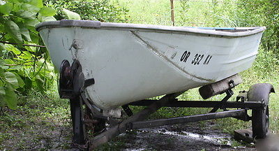 12 ft aluminum fishing boat with 2 motors and Trailer