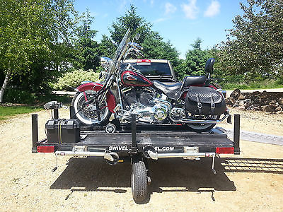 Motorcycle trailer with docking station, wireless winch. $1600
