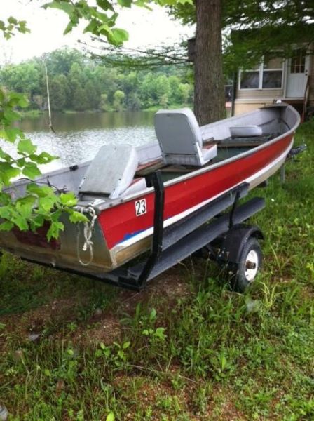 1959 Boat, 5 horse powered motor and trailer located in Owensville, Mo