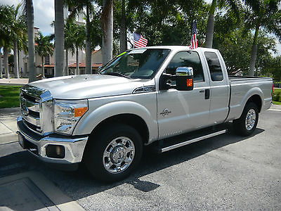 Ford : F-250 F-250 XLT SUPERCAB  2014 ford f 250 xlt supercab 6.7 diesel silver with black leather interior 26 k m