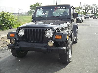 Jeep : Wrangler Sahara Sport Utility 2-Door Black Jeep Wrangler Sahara 2 door with a tan soft top and manual transmission!