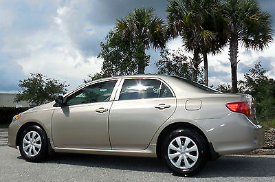 Toyota : Corolla CARFAX CERTIFIED NO ACCIDENTS GAS SAVER!  CLEAN & SIMPLE SEDAN~MANUAL~RUST FREE 1 FLORIDA OWNER~40 mpg!~SET TO GO~11 12 13