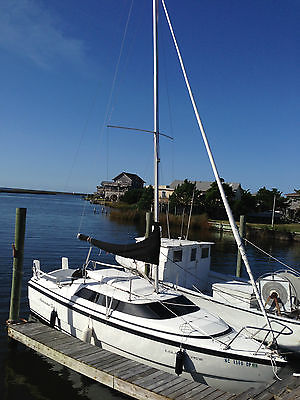 Macgregor 26 X Sailboat with Auto pilot GPS trailer and Honda 50 outboard.