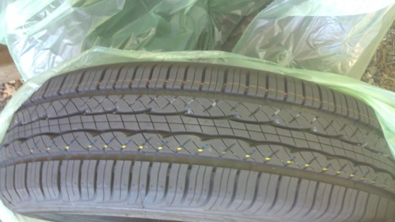 4 Brand new P195/75/r14 tires, 1
