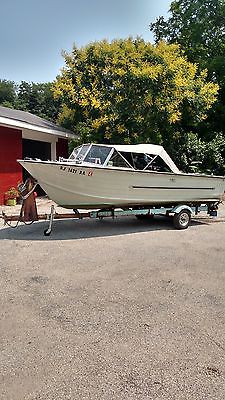 18' Starcraft motorboat with trailer, custom canopy and cover. great runner!