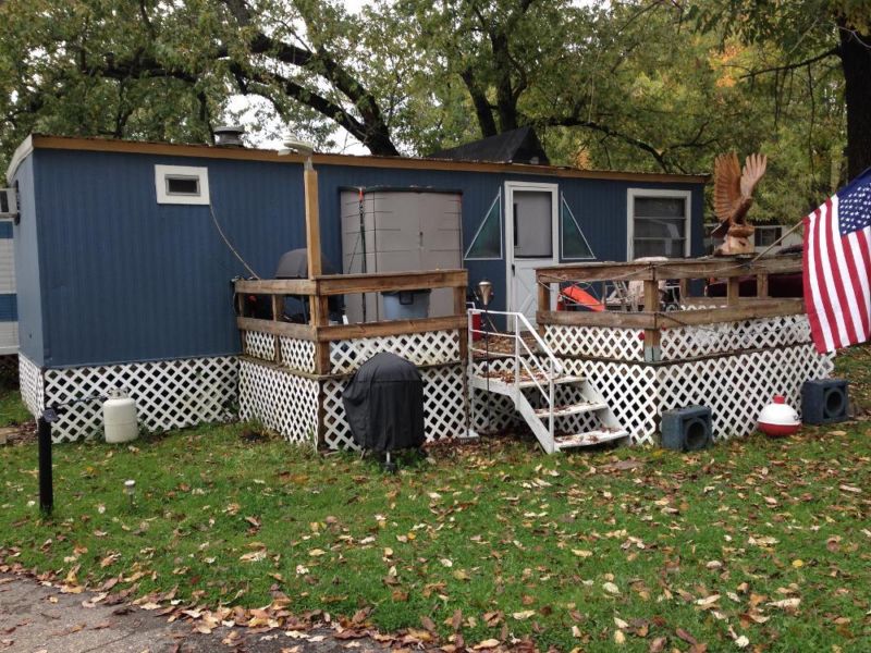 Trailer, furnished, large attached deck, and boat dock included