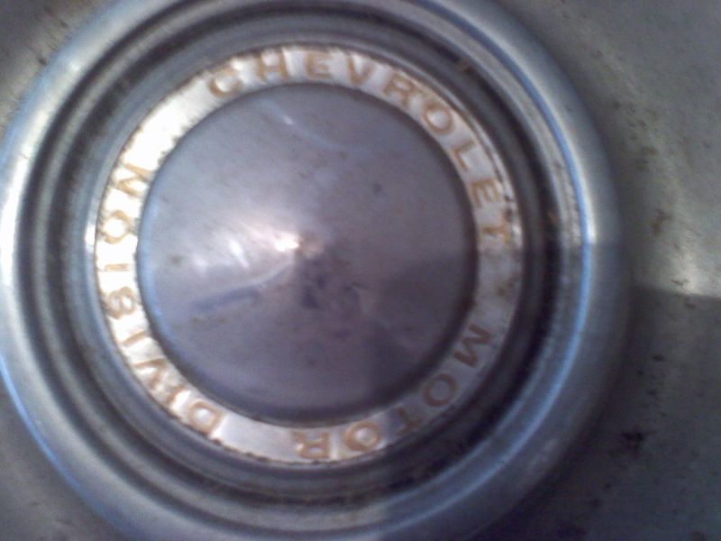 2 1974 chevrolet hubcaps, 1