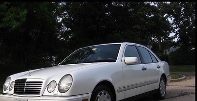 Mercedes-Benz : E-Class White, clean title with $142k, very good mechanical condition.