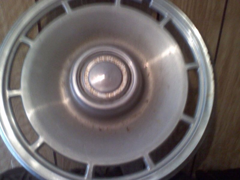 2 1974 chevrolet hubcaps, 0