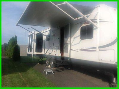 2012 Heartland North Country 31RETS 34' Travel TRLR 2 Slide Outs Fireplace TV