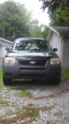 Ford : Escape XLS Black light truck with running boards and trailer tow bar