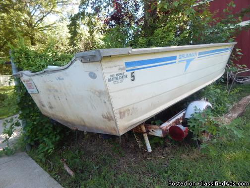 15.5 foot fishing boat plus free trailer