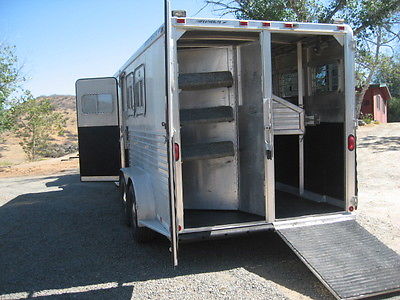 This trailer in excellent condition, drop down windows, improved living quarters