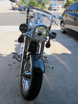 Harley-Davidson : Softail Total Custom makover, chrome wheels, chrome swing arms, and chrome on everything