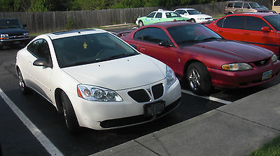 Pontiac : G6 GT 2006 white g 6 gt with sunroof coupe also 2004 ford explorer