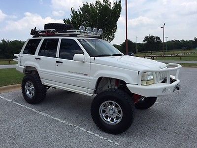 Jeep : Grand Cherokee 5.9 Limited Sport Utility 4-Door 1998 5.9 liter jeep grand cherokee lifted roof rack off road tires winch