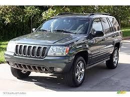 Jeep : Grand Cherokee Dark Grey  Jeep Grand Cherokee 2002 V8 (great condotion) needs engine tune