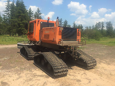 Tucker snowmobile trail grooming tractor