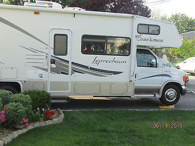 Beautiful 31' 2005 Leprechaun RV with only 11,700 miles.TV UP FRONT and extras.