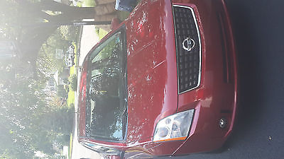 Nissan : Sentra base 2009 red nissan sentra excellent condition