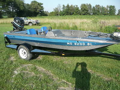 1983 Cheetah Bass Boat with 50 HP Mercury motor and original trailer.