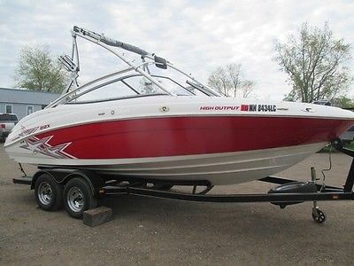 2010 212X with twin 160hp engines, cover, custom trailer, wake board tower